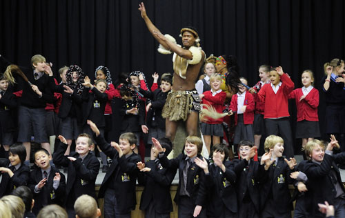 On stage with children